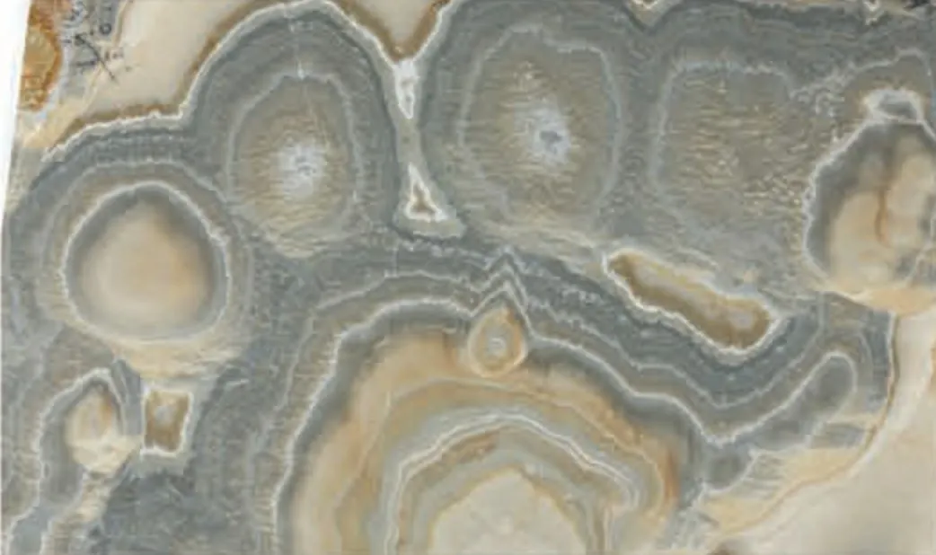 Cloudy Onyx slab, grey and tan concentric rings