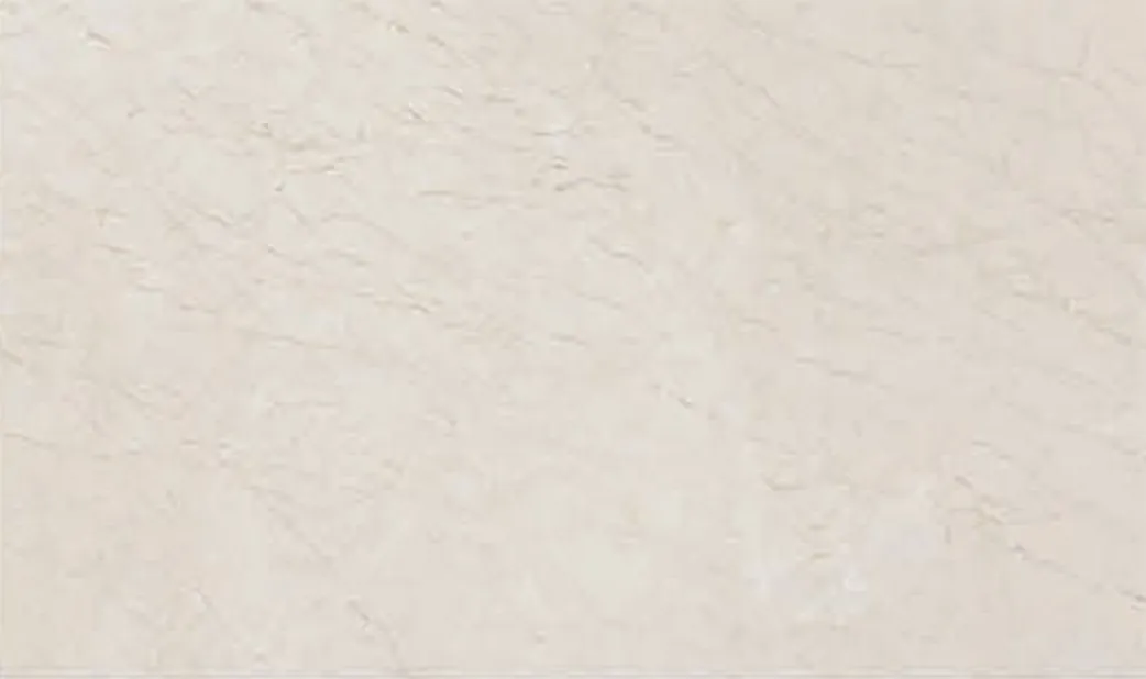 Crema Diva slab, pale cream ground with a faint network of veins