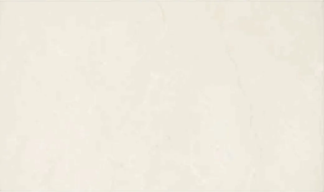 Crema Marfil slab, uniform cream ground with very light veining