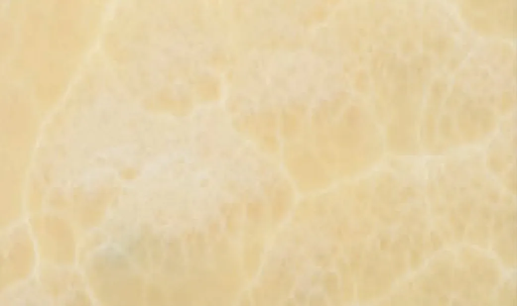 Golden Onyx swatch, translucent honey-gold with cloud-like cells