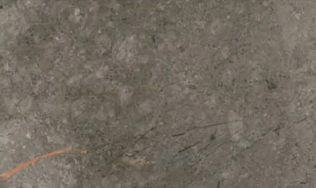 Grey William slab, mid-grey ground with a fine grain and occasional rust line