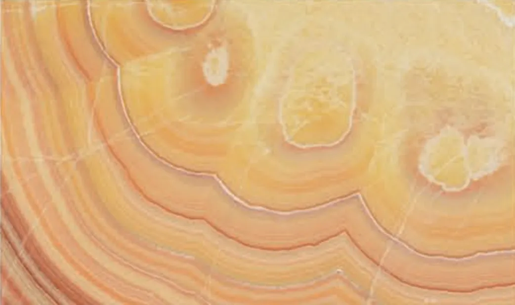 Paradise Onyx swatch, orange and yellow concentric bands