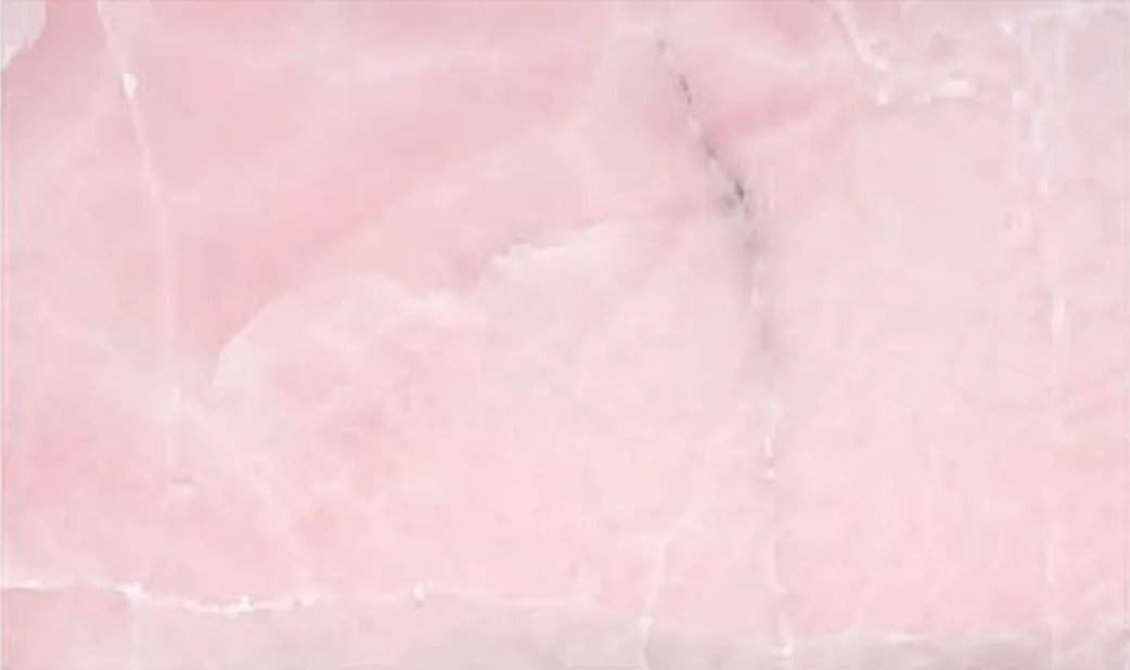 Pink Onyx slab, soft translucent pink with white clouding